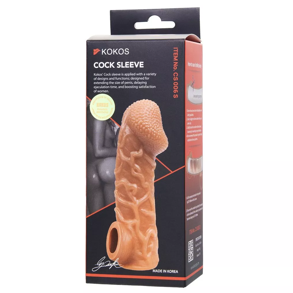 ТЕЛЕСНАЯ ЗАКРЫТАЯ НАСАДКА С ВЕНКАМИ COCK SLEEVE 006 SIZE S 13,8 СМ. Вид 7.